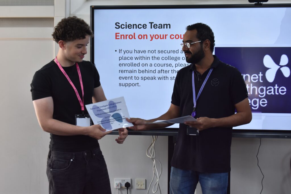 Student receiving his Science Certificate