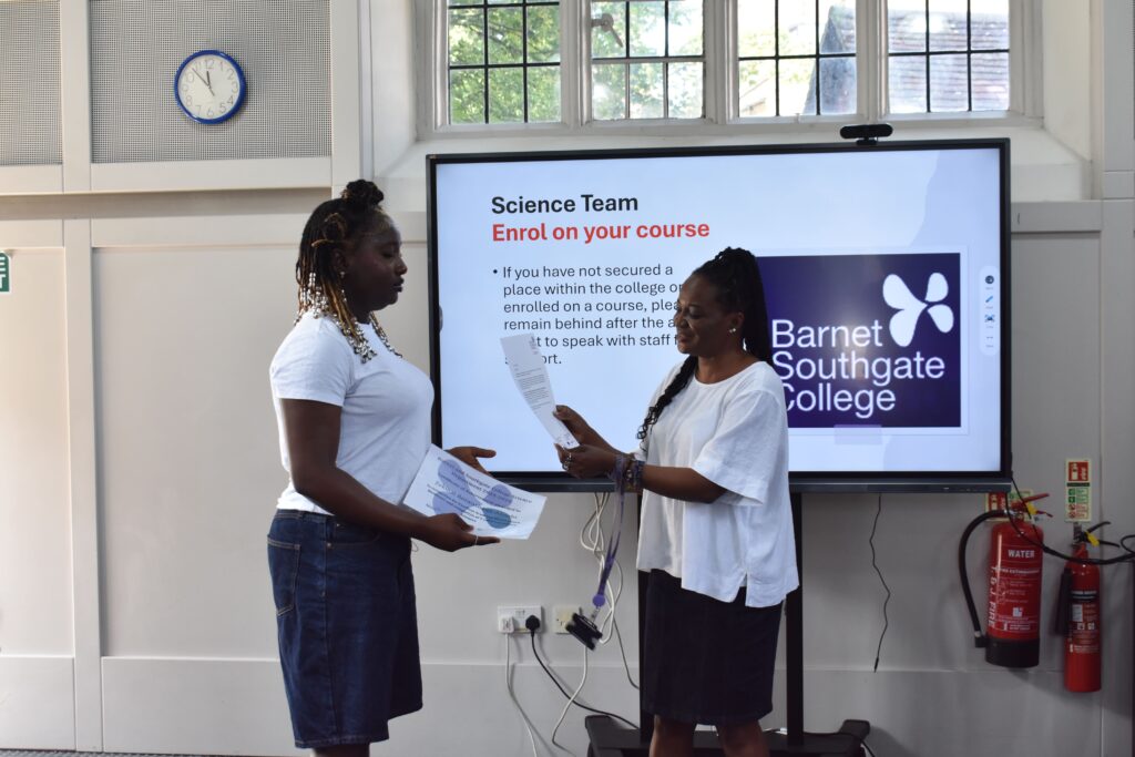 Student Zekina receiving her T level Certificate