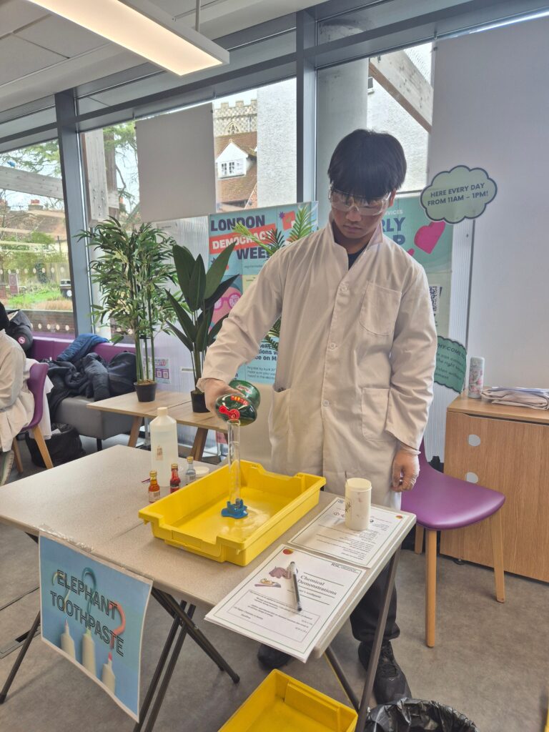 student doing science experiment