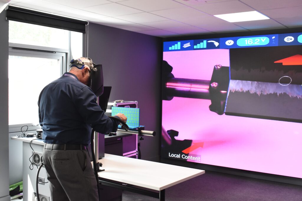 Engineering tutor demonstrates using technologies