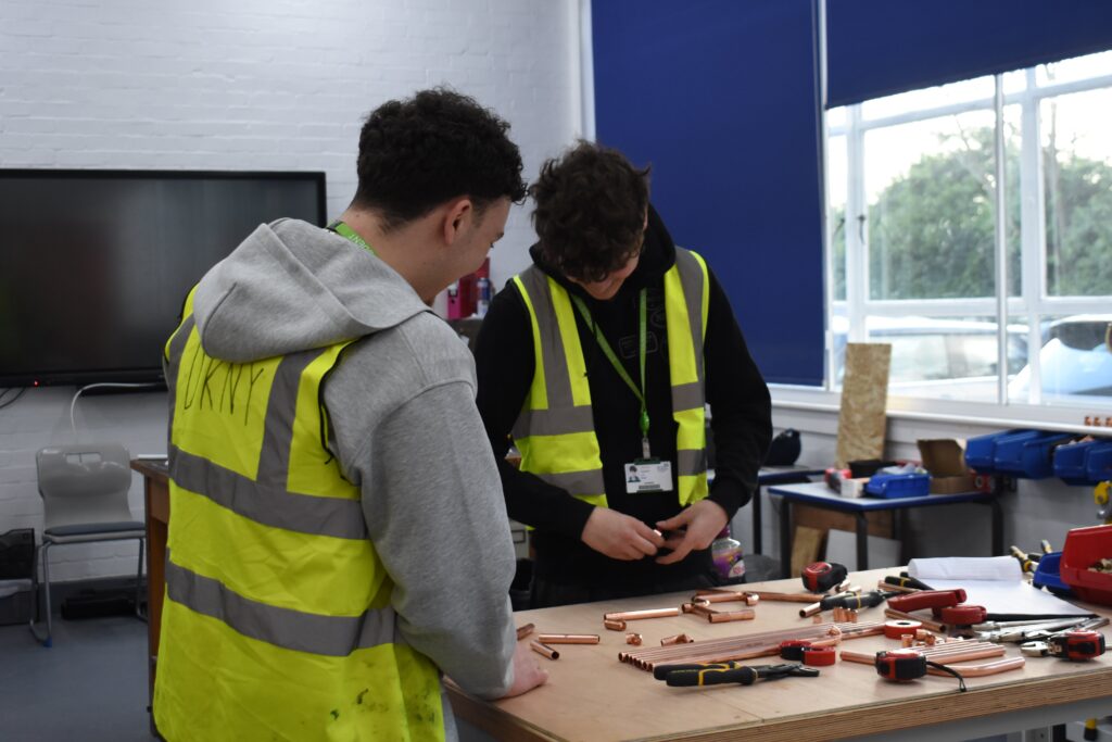 Plumbing students doing workshop