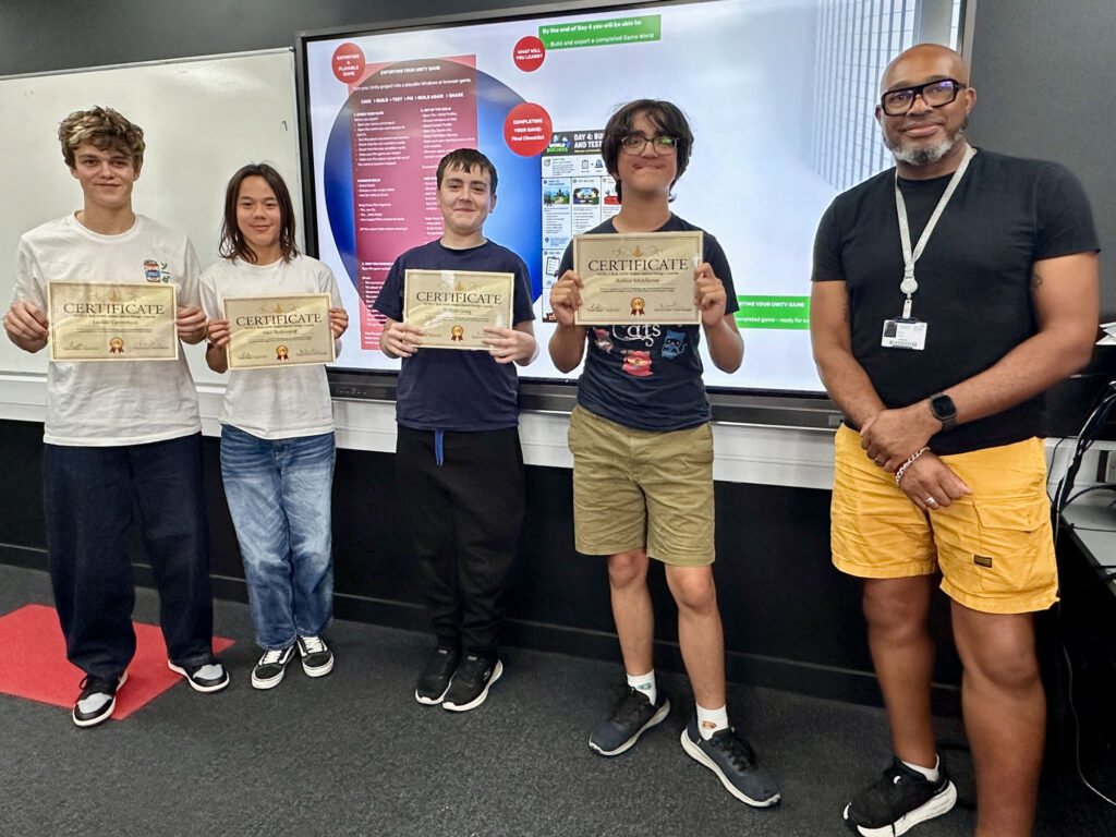 World Builder student holding their certificates after completing the course.